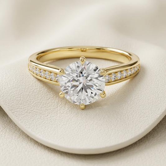 Round diamond pavé solitaire.
Yellow gold round diamond.
Round solitaire with pavé band.
Pavé set diamond solitaire.
Classic round diamond design.
Luxury round diamond solitaire.
Yellow gold pavé diamond.
Elegant round solitaire.
Brilliant round cut diamond.
Round diamond pavé setting.