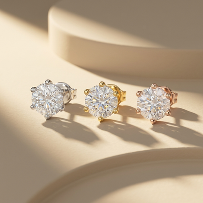 Round diamond solitaire stud earrings available in white, yellow, and rose gold finishes.
Luxury round brilliant diamond stud earrings crafted in white, yellow, and rose gold.
Elegant solitaire diamond stud earrings showcased in three premium gold tones.
Fine jewelry round diamond studs featuring brilliant center stones in three gold finishes.
Contemporary solitaire diamond earrings displayed in white, yellow, and rose gold.
Premium round brilliant diamond stud earrings designed in three luxurious gold colo