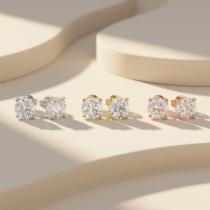 Round diamond stud earrings available in white, yellow, and rose gold finishes.
Luxury round diamond stud earrings crafted in white, yellow, and rose gold.
Elegant round solitaire diamond earrings showcased in three premium gold tones.
Fine jewelry round diamond studs featuring brilliant round-cut diamonds in three gold finishes.
Contemporary round diamond earrings displayed in white, yellow, and rose gold.
Premium round solitaire diamond stud earrings designed in three luxurious gold colors.
Designer round