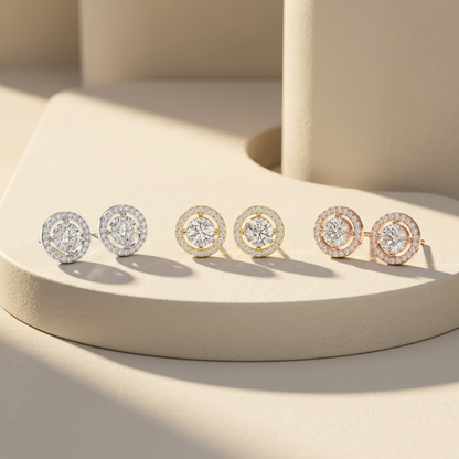 Round halo diamond stud earrings available in white, yellow, and rose gold finishes.
Luxury round halo diamond stud earrings crafted in white, yellow, and rose gold.
Elegant round halo diamond earrings featuring brilliant center stones in three gold tones.
Fine jewelry round halo diamond studs showcased in white, yellow, and rose gold.
Contemporary round halo diamond earrings with sparkling pavé halos in three finishes.
Premium halo diamond stud earrings designed in white, yellow, and rose gold colors.
Desi