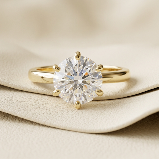 Round solitaire diamond ring in yellow gold.
Yellow gold round diamond ring.
Round diamond engagement ring.
Round solitaire gold ring.
Classic round diamond ring.
Elegant round solitaire ring.
Six-prong diamond ring.
Round cut gold diamond ring.
Luxury round solitaire ring.
Gold round diamond ring.