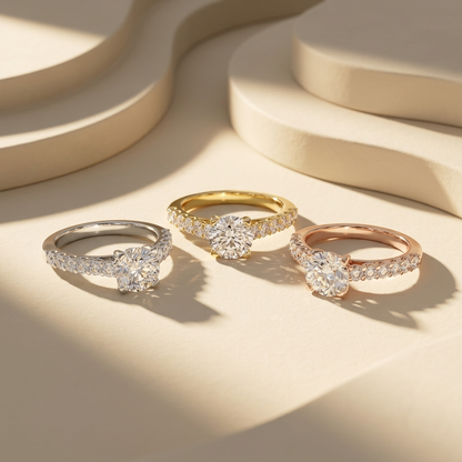 Round pavé solitaire rings in three gold tones.
Round diamond rings in white, yellow, and rose gold.
Pavé solitaire ring collection.
Triple gold round diamond rings.
Round engagement rings with pavé bands.
Luxury pavé solitaire rings.
Elegant round diamond ring collection.
Round solitaire rings with side stones.
Classic pavé diamond rings.
Round diamond rings in three gold colors.