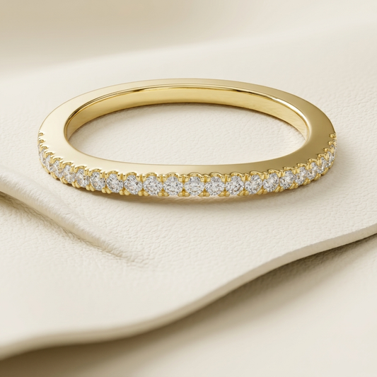 Slim gold band ring with pavé set diamonds close up
Elegant thin gold ring with continuous diamond sparkle
Minimalist gold band with fine pavé diamond setting
Delicate gold ring with small round diamonds detail
Fine jewelry slim band with shimmering diamond row
Premium thin gold ring with elegant pavé diamonds
Stylish minimal ring with subtle diamond accents
Sophisticated slim band ring with clean diamond design
Contemporary gold ring with micro pavé diamond setting
Dainty gold band with refined diamond det