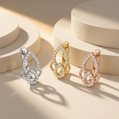 Teardrop diamond earrings in white yellow and rose gold
Luxury diamond earrings in three gold finishes
Elegant teardrop earrings collection
Fine jewelry diamond drop earrings display
Premium three tone diamond earrings
Modern teardrop diamond jewelry collection
Sparkling gold diamond earrings showcase
Designer diamond earrings comparison
Contemporary teardrop earrings in three metals
Luxury diamond earring collection