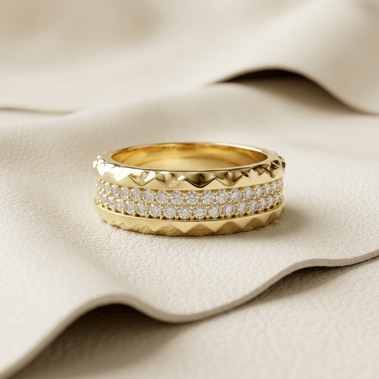 Yellow gold wide band ring with sparkling pave diamond center
Luxury gold diamond band featuring textured geometric edges
Wide yellow gold ring with double row pave diamond setting
Contemporary diamond band with polished faceted gold borders
Statement yellow gold pave diamond ring on ivory display
Fine jewelry wide band featuring brilliant round diamond rows
Modern gold ring with textured edges and diamond center panel
Elegant wide diamond band crafted in polished yellow gold
Designer pave diamond ring with