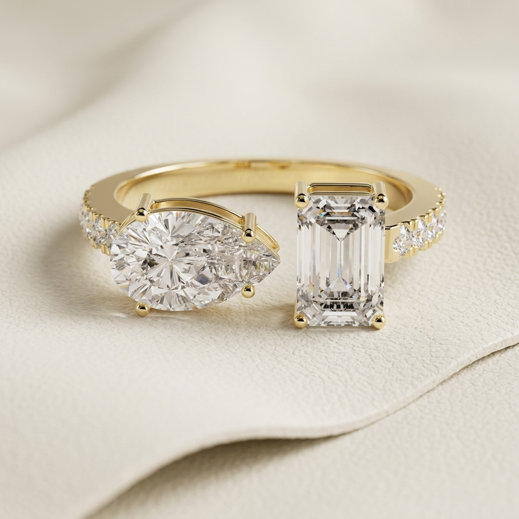 Toi et Moi diamond ring in yellow gold.
Pear and emerald cut diamond ring.
Yellow gold Toi et Moi engagement ring.
Two stone diamond ring with pavé band.
Pear and emerald diamond ring.
Modern Toi et Moi diamond ring.
Two stone engagement ring in gold.
Pear and emerald cut ring.
Elegant dual diamond ring.
Yellow gold two stone diamond ring.