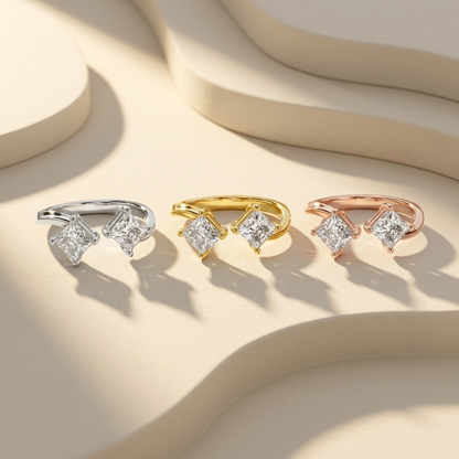 Elegant open rings in white, yellow, and rose gold tones
Stylish trio of rings featuring princess cut diamonds
Minimal dual diamond rings in three gold variations
Fine jewelry collection with modern open band design
Contemporary rings with twin diamond settings in tri-tone gold
Premium open rings with clean and balanced diamond layout
Luxury trio of gold rings with sparkling square diamonds
Sophisticated collection of multi-tone diamond rings
Close-up of three open rings with geometric diamond style
Designe