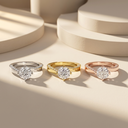 Three curved pavé solitaire rings in white yellow and rose gold
Tricolor round diamond engagement rings with sweeping bands
Elegant solitaire diamond ring trio displayed in warm light
White yellow and rose gold rings with brilliant round diamonds
Luxury three tone diamond rings featuring curved pavé accents
Modern round solitaire rings with asymmetrical gold bands
Designer engagement ring collection in three polished gold tones
Fine jewelry trio with sparkling round center diamonds
Sophisticated tricolor so