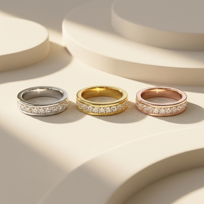 White yellow and rose gold bands with channel set princess diamonds
Three polished bands featuring continuous square diamond rows
Tricolor gold bands showcasing aligned princess cut diamond accents
Elegant diamond bands with geometric stones secured in sleek channels
Brilliant square diamonds arranged across three refined gold finishes
Fine jewelry band trio featuring structured channel setting details
Radiant mixed gold bands with symmetrical princess diamond sequences
Contemporary three tone bands showcas