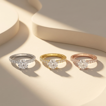 Three round solitaire rings in white yellow and rose gold
Tricolor diamond engagement rings with brilliant round center stones
Luxury solitaire ring trio featuring sparkling pavé bands
White yellow and rose gold rings with large round diamonds
Elegant three-tone engagement ring collection in warm studio light
Classic round diamond rings with shimmering pavé set bands
Fine jewelry trio featuring brilliant solitaire diamond designs
Glamorous round cut rings in three polished gold tone variations
Designer diam