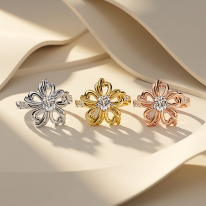 White yellow and rose gold floral rings with round center diamonds
Three sculpted blossom rings featuring sweeping open petal designs
Tricolor gold flower rings centered with brilliant solitaire diamonds
Elegant diamond ring trio with artistic curved petal settings
Radiant floral rings crafted in three polished gold finishes
Fine jewelry blossom ring collection with diamond accented bands
Intricate openwork flower rings showcasing luminous center stones
Graceful mixed gold floral rings with layered ribbon s