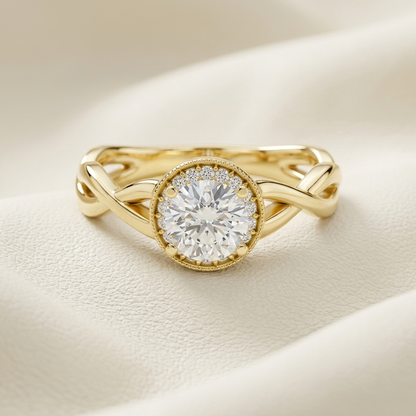 Yellow gold twisted halo diamond ring featuring a brilliant round center diamond.
Elegant twisted band halo diamond ring crafted in polished yellow gold.
Luxury yellow gold diamond ring with a round halo and intertwined band design.
Fine jewelry twisted halo ring showcasing a brilliant round-cut center diamond.
Contemporary yellow gold halo diamond ring with an elegant crossover band.
Premium twisted yellow gold ring featuring a sparkling pavé halo and solitaire diamond.
Designer twisted halo diamond ring c