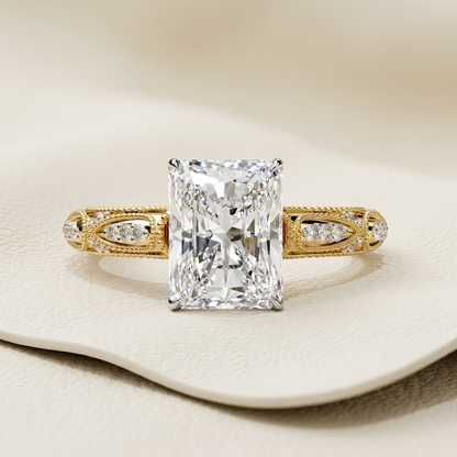 Vintage Radiant Diamond Engagement Ring Design
Radiant Cut Diamond Ring With Milgrain Band
Antique Style Radiant Diamond Gold Ring Design
Radiant Solitaire Ring With Pave Side Details
Elegant Radiant Diamond Ring With Vintage Band
Decorative Radiant Cut Diamond Bridal Ring Style
Radiant Diamond Ring With Intricate Gold Band
Fine Radiant Diamond Ring With Vintage Accents
Classic Radiant Engagement Ring With Pave Design
Luxury Radiant Diamond Ring With Ornate Band