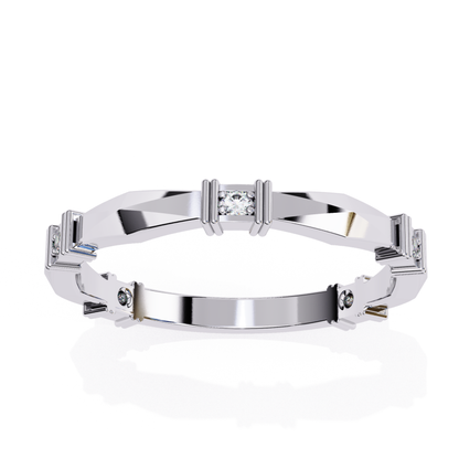 Polished white gold ring with round and baguette diamonds set in an angular pattern.