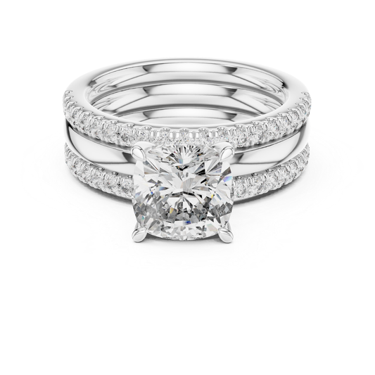 White gold cushion cut diamond bridal ring set
Cushion cut diamond engagement ring set
White gold diamond wedding ring stack
Cushion solitaire ring with diamond bands
White gold bridal set with round diamonds
Luxury cushion cut diamond ring set
Diamond engagement ring with matching bands
White gold cushion diamond wedding set
Elegant bridal ring stack with Pave diamonds
Cushion cut solitaire diamond ring in white gold