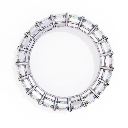 White gold eternity ring with emerald diamonds
Emerald cut diamonds in white gold eternity band
Continuous emerald diamonds set in white gold
Top view of white gold eternity ring
Close up of white gold band with emerald diamonds
Side view of white gold diamond eternity ring
Polished white gold band with emerald diamonds
White gold band featuring emerald cut diamonds
Elegant white gold eternity band
Classic white gold ring with emerald diamonds