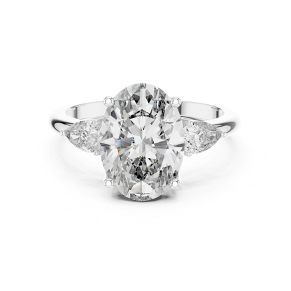 White gold oval diamond ring with pear accents
White gold oval and pear diamond ring
Oval diamond ring with pear side diamonds
White gold oval solitaire with pear diamonds
Oval center diamond ring in white gold
Pear accent diamond ring in white gold
White gold oval diamond statement ring
Oval diamond ring with tapered pear stones
White gold oval center diamond ring
White gold pear accent engagement ring