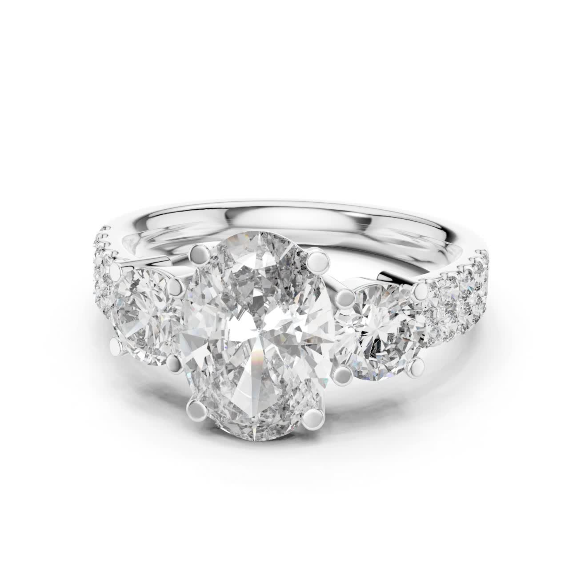 White gold oval three stone diamond engagement ring
Oval cut diamond ring with pave side stones
White gold oval diamond ring with accent diamonds
Three stone oval diamond bridal ring in white gold
Oval lab diamond ring with round side stones
White gold prong set oval diamond ring design
Classic oval diamond engagement ring with pave band
Minimal white gold oval diamond statement ring
Oval center stone ring with diamond accented shank
Elegant white gold oval diamond wedding ring