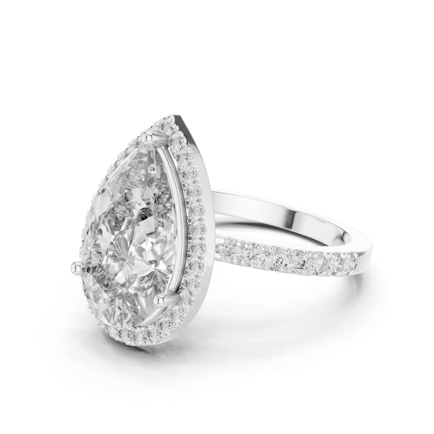 White gold pear diamond halo ring angled view
Angled view of white gold pear diamond halo ring
White gold pear cut diamond halo engagement ring
Pear solitaire diamond ring with halo setting
White gold pear diamond ring with pave band
Pear shaped halo ring in white gold
White gold pear lab grown diamond ring
White gold pear halo ring with pave band
Angled white gold pear engagement ring
White gold pear halo diamond ring