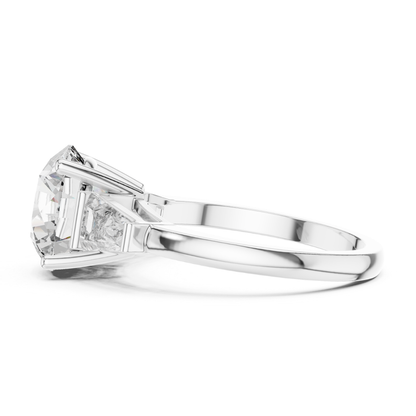 White gold round brilliant three stone ring side view
Side view of round brilliant three stone ring
White gold round brilliant ring with trapezoid side stones
Round brilliant diamond ring with elevated setting
White gold three stone ring profile
Lab grown round brilliant three stone ring
White gold ring with tapered side diamonds
Side profile of round brilliant engagement ring
White gold polished three stone diamond ring
Round brilliant ring with open gallery setting