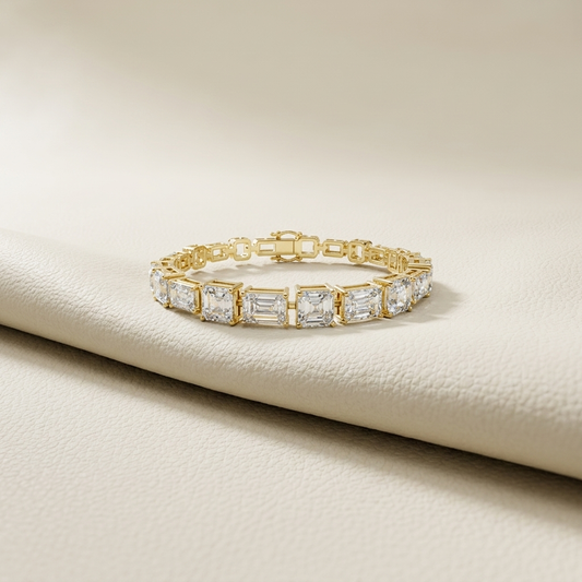 Yellow gold emerald cut diamond line bracelet
Luxury rectangular diamond tennis bracelet in yellow gold
Elegant emerald cut diamond link bracelet on ivory background
Fine jewelry yellow gold multi stone diamond bracelet
Premium emerald shape diamond bracelet with box clasp
Sparkling rectangular cut diamond line bracelet close up
Luxury yellow gold emerald diamond statement bracelet
Contemporary geometric diamond tennis bracelet design
Elegant emerald cut diamond bracelet displayed on cream surface
Yellow go