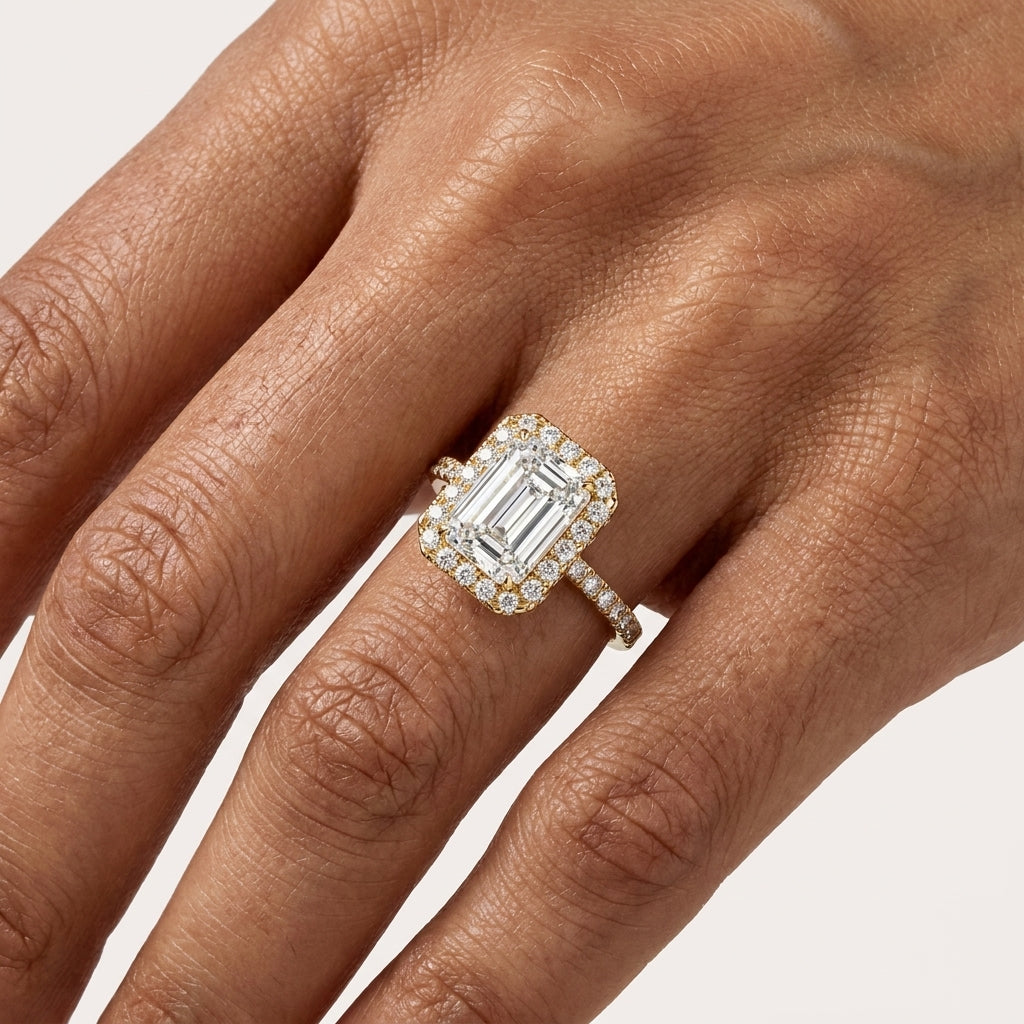 Yellow Gold Emerald Cut Halo Diamond Ring On Finger
Emerald Cut Halo Diamond Ring Worn on Hand
Yellow Gold Emerald Diamond Ring Hand Model
Emerald Cut Diamond Halo Ring Finger View
Yellow Gold Halo Diamond Ring on Ring Finger
Emerald Diamond Engagement Ring on Hand
Yellow Gold Emerald Cut Diamond Ring Lifestyle
Halo Set Emerald Diamond Ring on Finger
Emerald Cut Diamond Ring Hand Close Up
Yellow Gold Halo Emerald Diamond Ring Worn