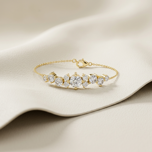 Yellow gold graduated diamond cluster bracelet with delicate chain
Centered brilliant diamond arrangement on fine gold bracelet
Luxury asymmetric diamond cluster bracelet with lobster clasp
Delicate gold chain bracelet featuring graduated round diamonds
Statement center diamond bracelet displayed on textured ivory surface
Fine jewelry diamond spray bracelet with scattered stone design
Elegant gold bracelet with prominent central brilliant cut diamond
Contemporary clustered diamond chain bracelet in yellow g