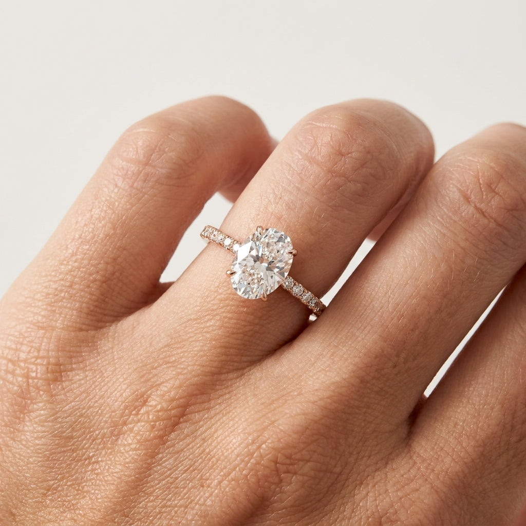 Yellow Gold Oval Cut Diamond Solitaire Ring On Finger
Oval Cut Diamond Solitaire Ring Worn on Hand
Yellow Gold Oval Diamond Ring Hand Model
Oval Cut Diamond Ring Finger View
Yellow Gold Oval Solitaire Ring on Ring Finger
Oval Diamond Engagement Ring on Hand
Yellow Gold Oval Cut Diamond Ring Lifestyle
Four Prong Oval Diamond Ring on Finger
Oval Cut Diamond Ring Hand Close Up
Yellow Gold Oval Diamond Solitaire Ring Worn