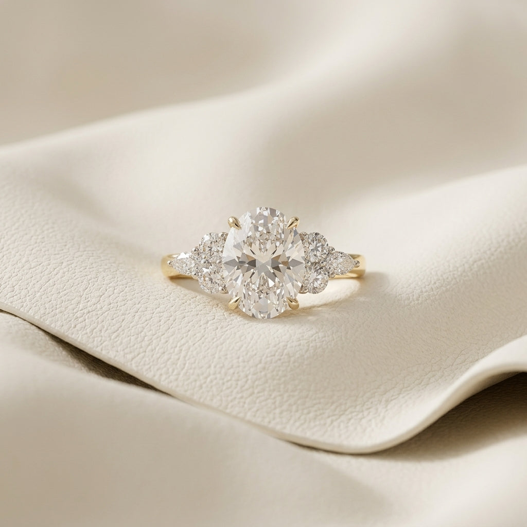 Yellow Gold Oval Cut Three Stone Diamond Ring
Oval Cut Three Stone Diamond Ring in Yellow Gold
Yellow Gold Oval Diamond Three Stone Ring
Oval Cut Diamond Ring with Side Stones
Yellow Gold Three Stone Engagement Ring
Oval Center Diamond Three Stone Gold Ring
Yellow Gold Oval Diamond Ring with Side Diamonds
Three Stone Oval Diamond Gold Ring
Oval Cut Diamond Three Stone Ring Close View
Yellow Gold Oval Three Stone Diamond Ring
