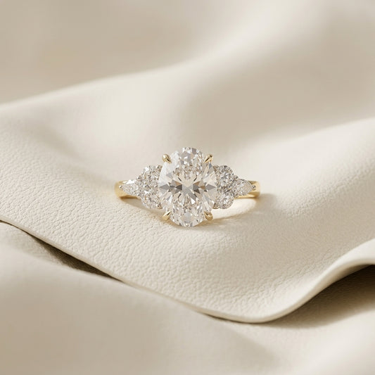 Yellow Gold Oval Cut Three Stone Diamond Ring
Oval Cut Three Stone Diamond Ring in Yellow Gold
Yellow Gold Oval Diamond Three Stone Ring
Oval Cut Diamond Ring with Side Stones
Yellow Gold Three Stone Engagement Ring
Oval Center Diamond Three Stone Gold Ring
Yellow Gold Oval Diamond Ring with Side Diamonds
Three Stone Oval Diamond Gold Ring
Oval Cut Diamond Three Stone Ring Close View
Yellow Gold Oval Three Stone Diamond Ring