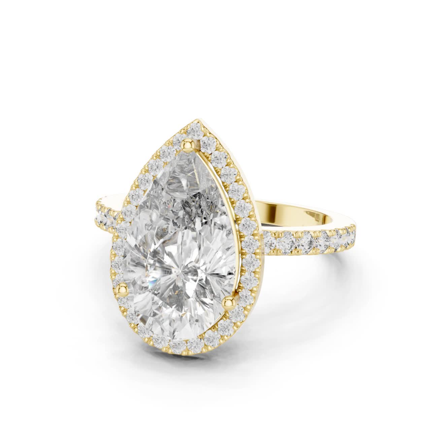 Yellow gold pear diamond halo ring angled view
Angled view of yellow gold pear diamond halo ring
Yellow gold pear cut diamond halo engagement ring
Pear solitaire diamond ring with halo setting
Yellow gold pear diamond ring with pave band
Pear shaped halo ring in yellow gold
Yellow gold pear lab grown diamond ring
Yellow gold pear halo ring with pave band
Angled yellow gold pear engagement ring
Yellow gold pear halo diamond ring