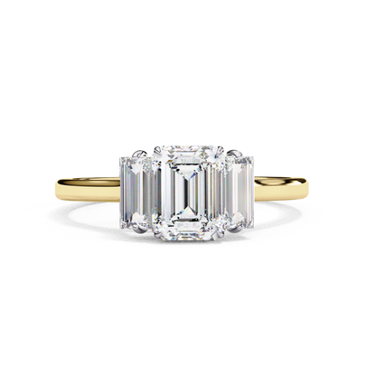 Yellow gold band with emerald diamonds
Three emerald cut diamonds in yellow gold
Yellow gold ring with three diamonds
Three stone emerald cut ring
Close up of yellow gold ring with diamonds
Elegant three stone emerald ring
Side view of yellow gold emerald ring
Yellow gold band with three emerald stones
Three diamonds set in yellow gold
Top view of yellow gold emerald ring