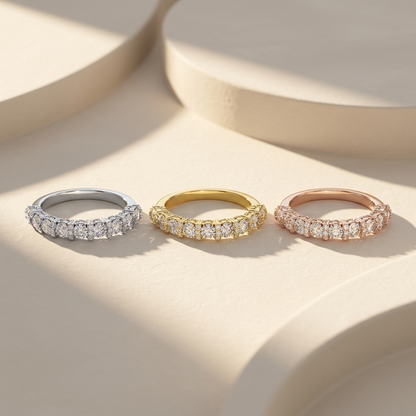 White yellow and rose gold bands with clustered round diamond accents
Three polished bands featuring graduated brilliant diamond arrangements
Tricolor gold bands with alternating large and petite sparkling stones
Elegant diamond bands showcasing richly layered cluster settings
Brilliant round diamonds arranged across three refined gold finishes
Fine jewelry band trio featuring textured diamond sequences
Radiant mixed gold bands with prominent stones and delicate side clusters
Sculptural three tone bands com