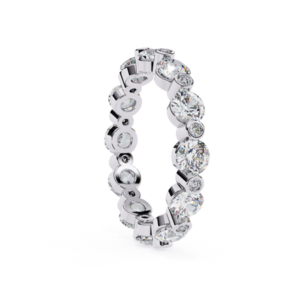 Angled side view of a white gold eternity band featuring round cut diamonds