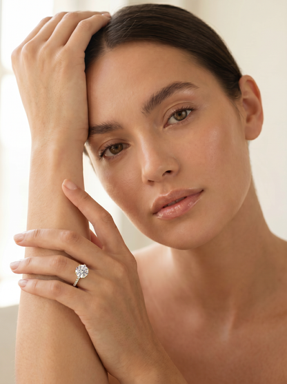 Round brilliant lab grown diamond solitaire engagement ring in 14K yellow gold
2.67 ct round diamond center held in a four-prong setting above a pavé band
Yellow gold pavé engagement ring with IGI certified round center stone
Classic round solitaire ring with sparkling pavé shoulders on a white background