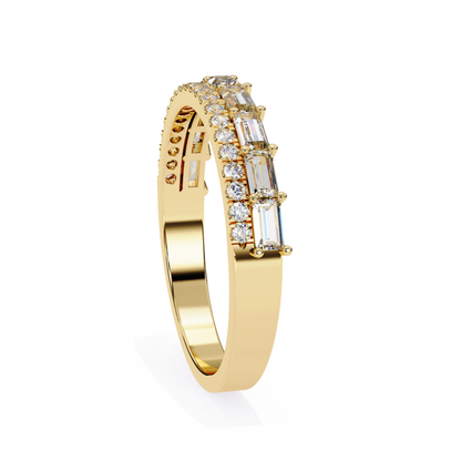 Angled view yellow gold ring with baguette and round diamonds